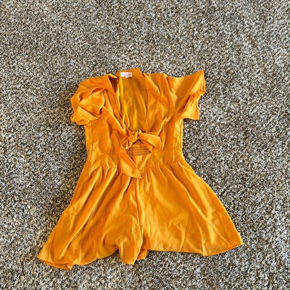 Pink Lily Other - Size small romper NWOT